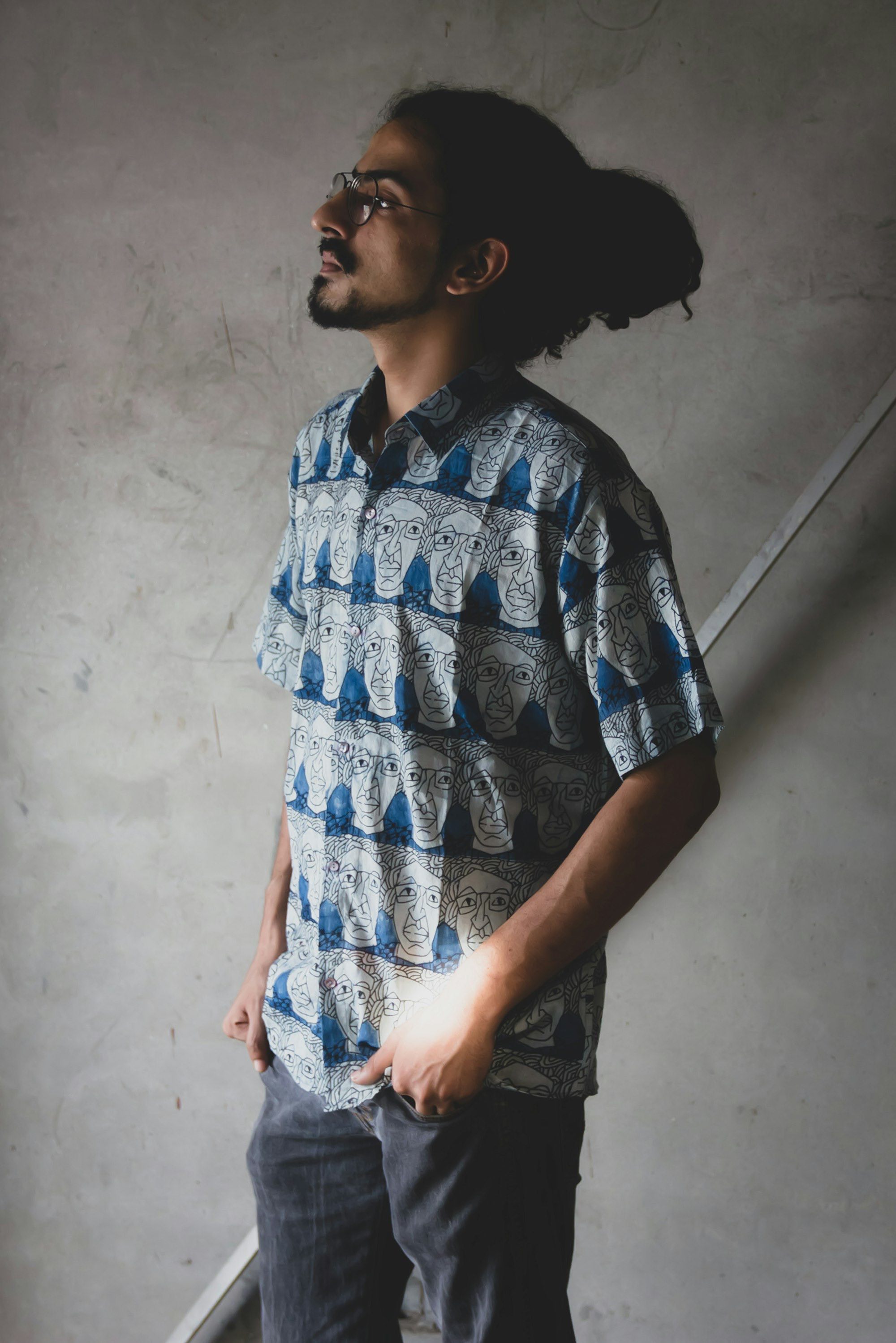 Man wearing a blue printed cotton shirt